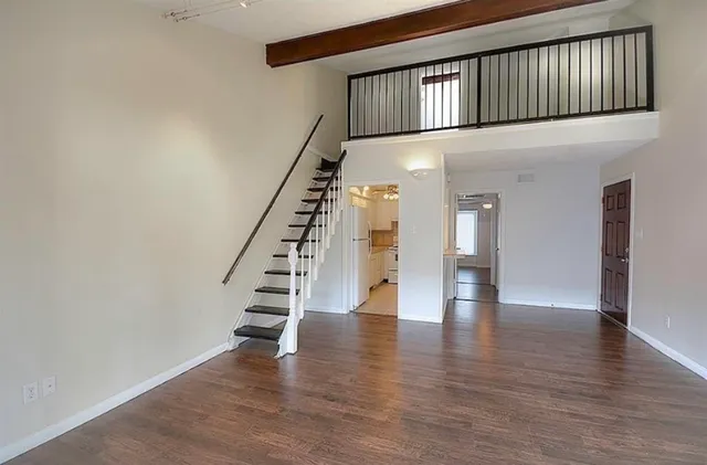 a view of entryway with wooden floor