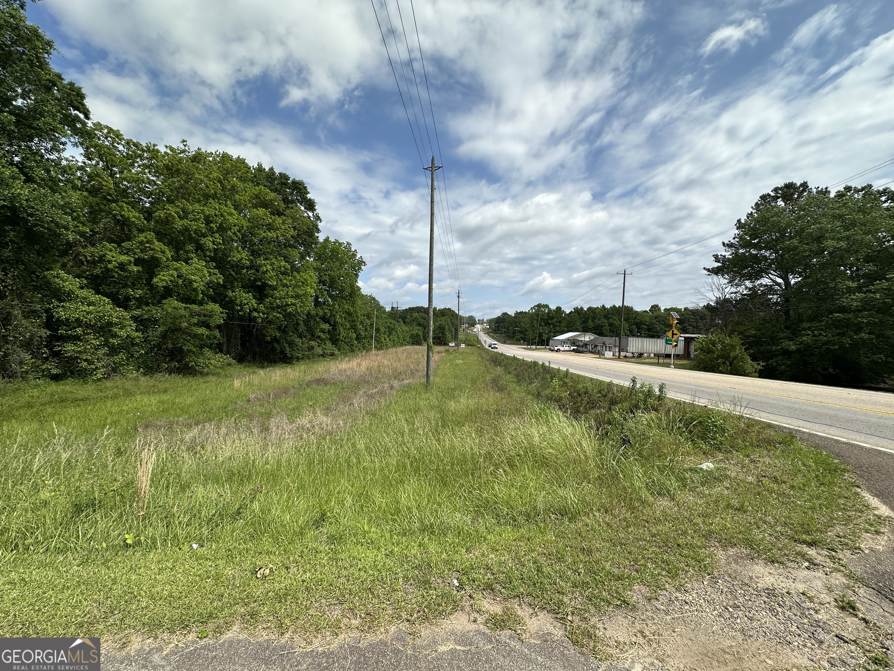 1800 Whitesville Road LaGrange, GA 30240 - Photo 7 of 10 a view of a golf course with a lake