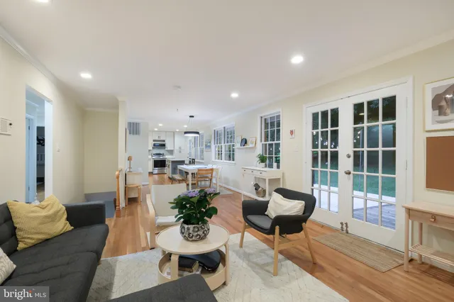 a living room with furniture and a table