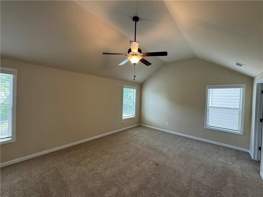 2287 Church Street Hampton, GA 30228 - Photo 8 of 11 a view of an empty room with a window