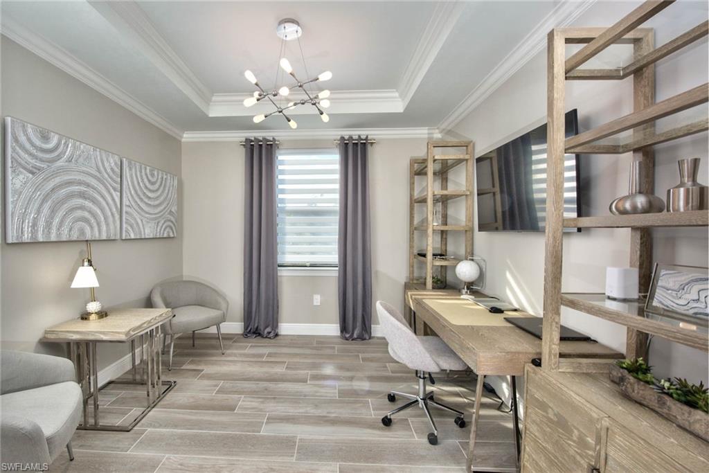 9761 Willet Court Naples, FL 34120 - Photo 18 of 34 a living room with furniture