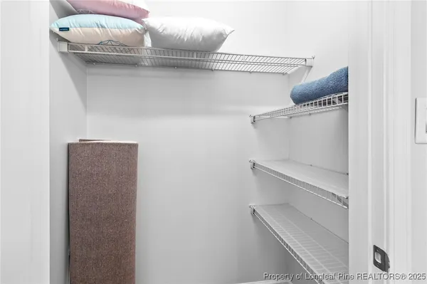 a bathroom with a bathtub and window