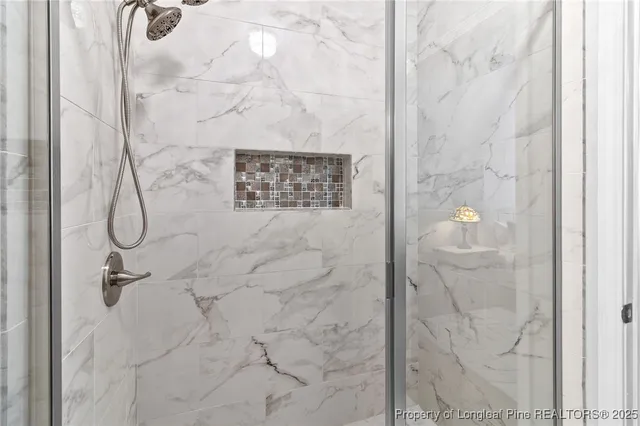 a bathroom with a sink vanity and a mirror