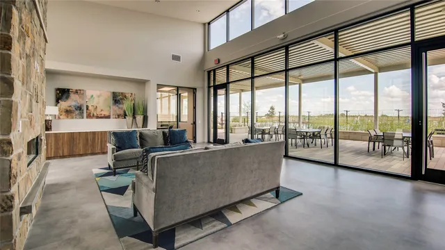 a view of a swimming pool and lounge chair