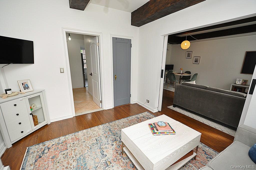 192 Garth Road, Unit TP Scarsdale, NY 10583 - Photo 20 of 43 Designed for both everyday living and effortless entertaining, the spacious living room flows seamlessly into a formal dining room that offers remarkable flexibility as a home office, den, or potential third bedroom.