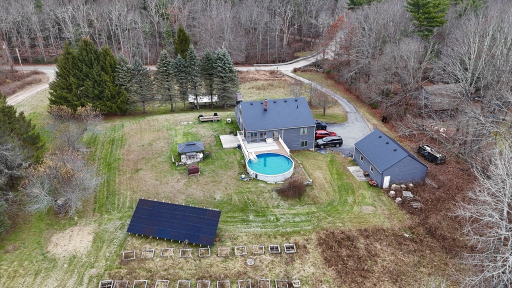 32 Hemlock Street Douglas, MA 01516 - Photo 3 of 11 a bird view of house with outdoor space