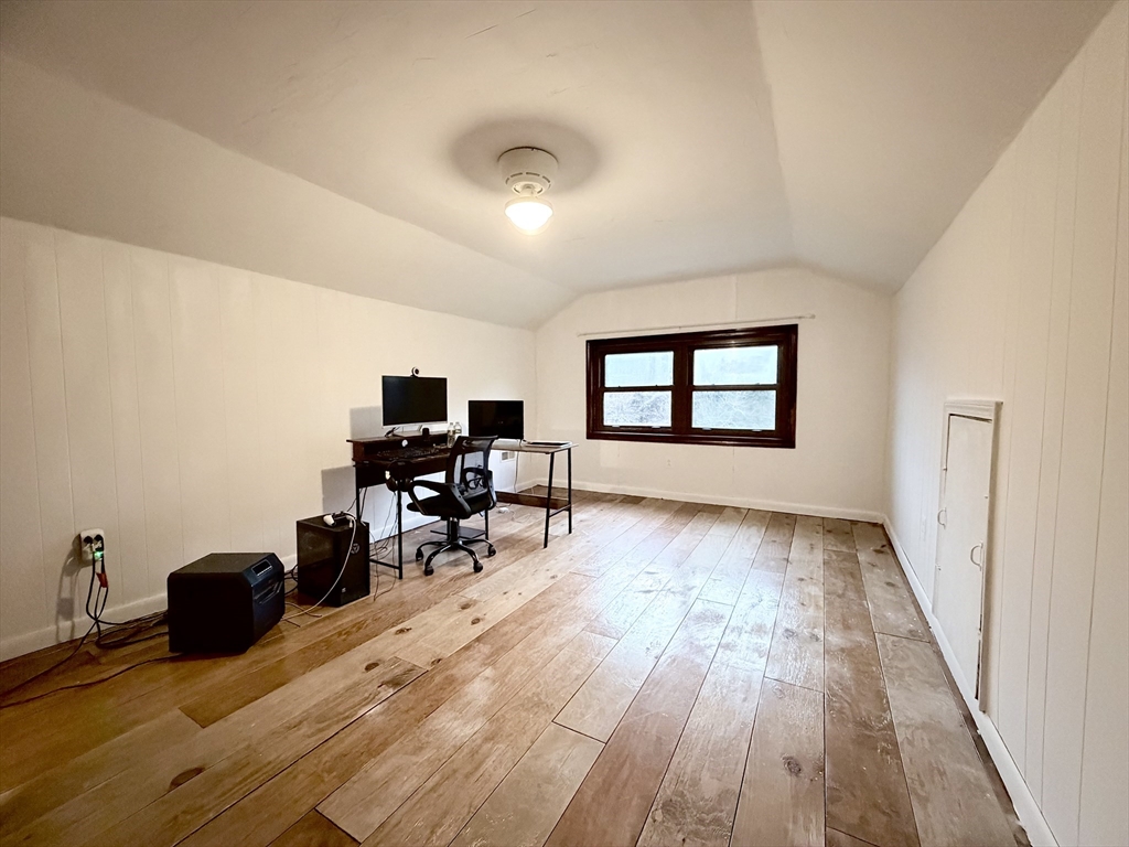32 Hemlock Street Douglas, MA 01516 - Photo 10 of 11 a living room with furniture and a wooden floor