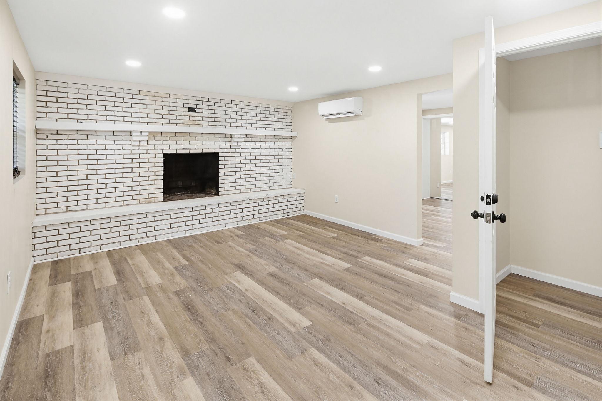119 Schoolhouse Road Sykesville, MD 21784 - Photo 33 of 51 Lower level family room with fireplace