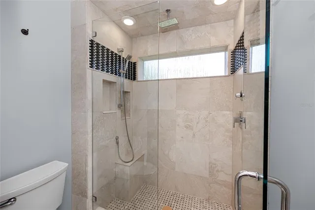 a view of a house with a yard and tree s