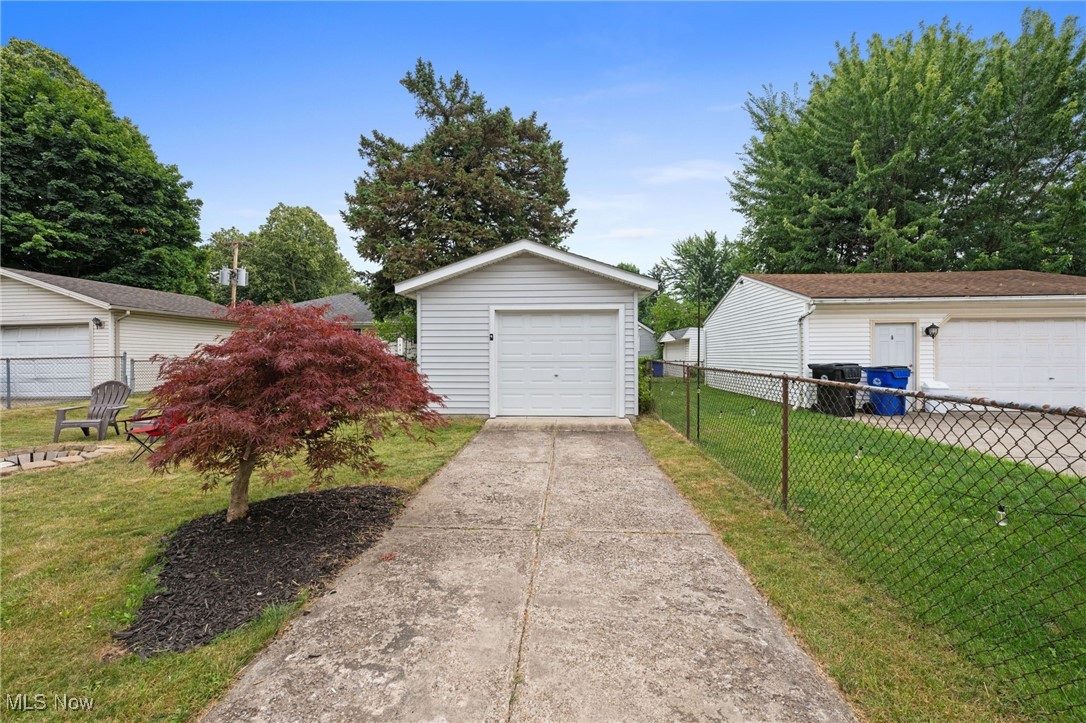 1107 Spring Road Cleveland, OH 44109 - Photo 23 of 31 Detached garage with storage room driveway