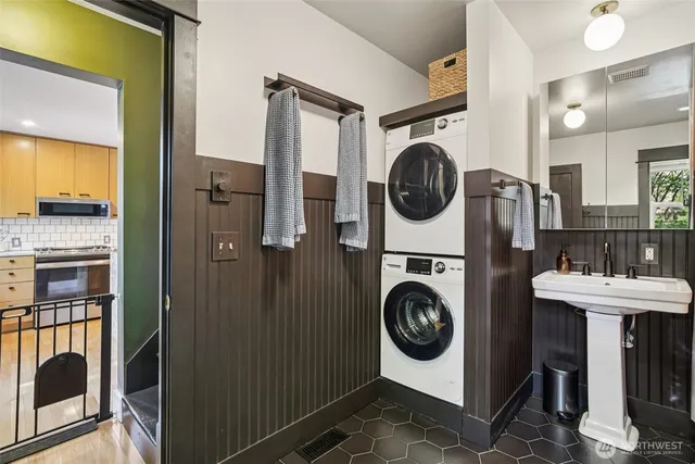 a utility room with dryer and washer
