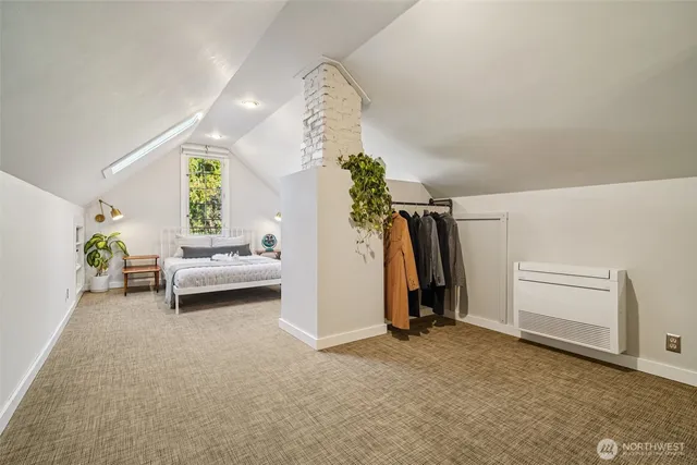 a view of a livingroom with furniture and a chandelier
