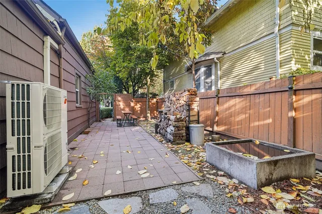 a view of a backyard with sitting area