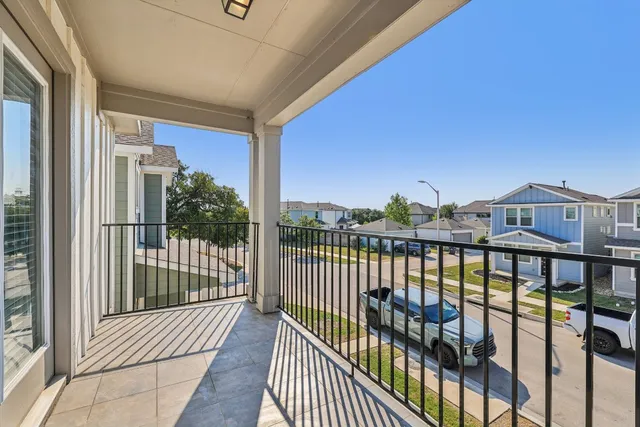 a view of city from a balcony