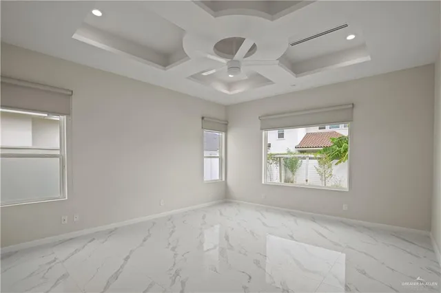 a bathroom with a double vanity sink a large mirror and shower