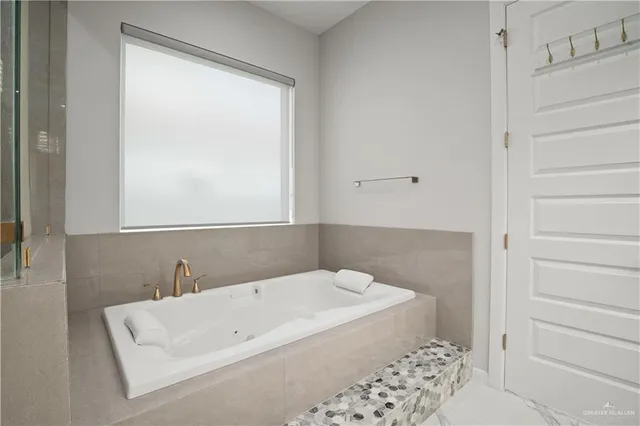 a kitchen that has a sink and cabinets