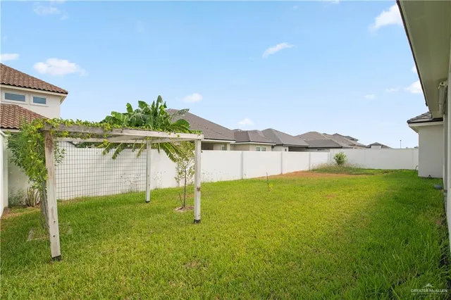 a view of a house with a garden