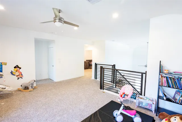 a bedroom with furniture and toys