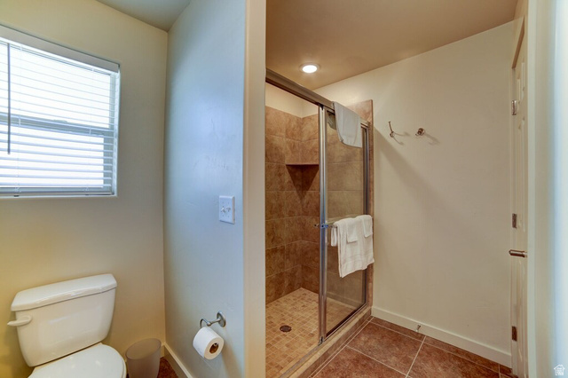 3853 South Red Valley Circle, Unit 22A1 Moab, UT 84532 - Photo 16 of 28 Full bath with a shower stall and tile patterned floors