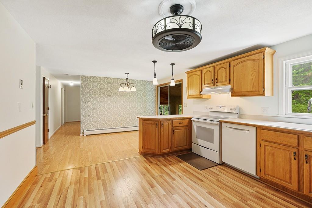 154 Ellis Road Westminster, MA 01473 - Photo 8 of 37 a kitchen with a sink cabinets and window