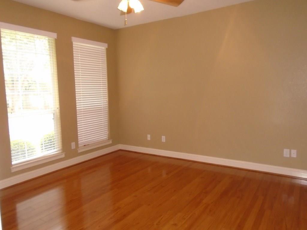 6905 Vista Ridge Court Fort Worth, TX 76132 - Photo 12 of 13 an empty room with a window
