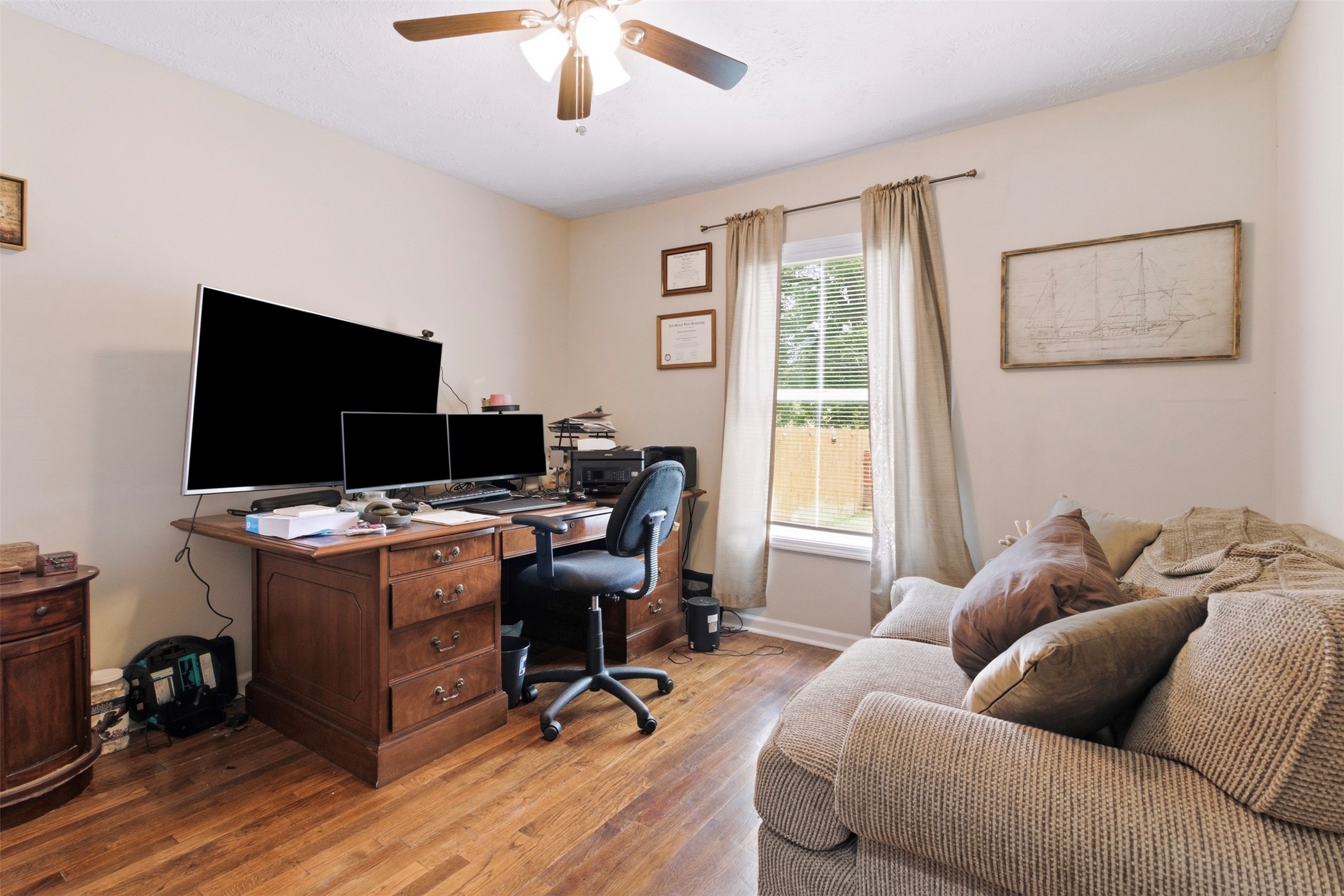 306 Center Street Pasadena, TX 77506 - Photo 11 of 31 a view of a livingroom with workspace and a window