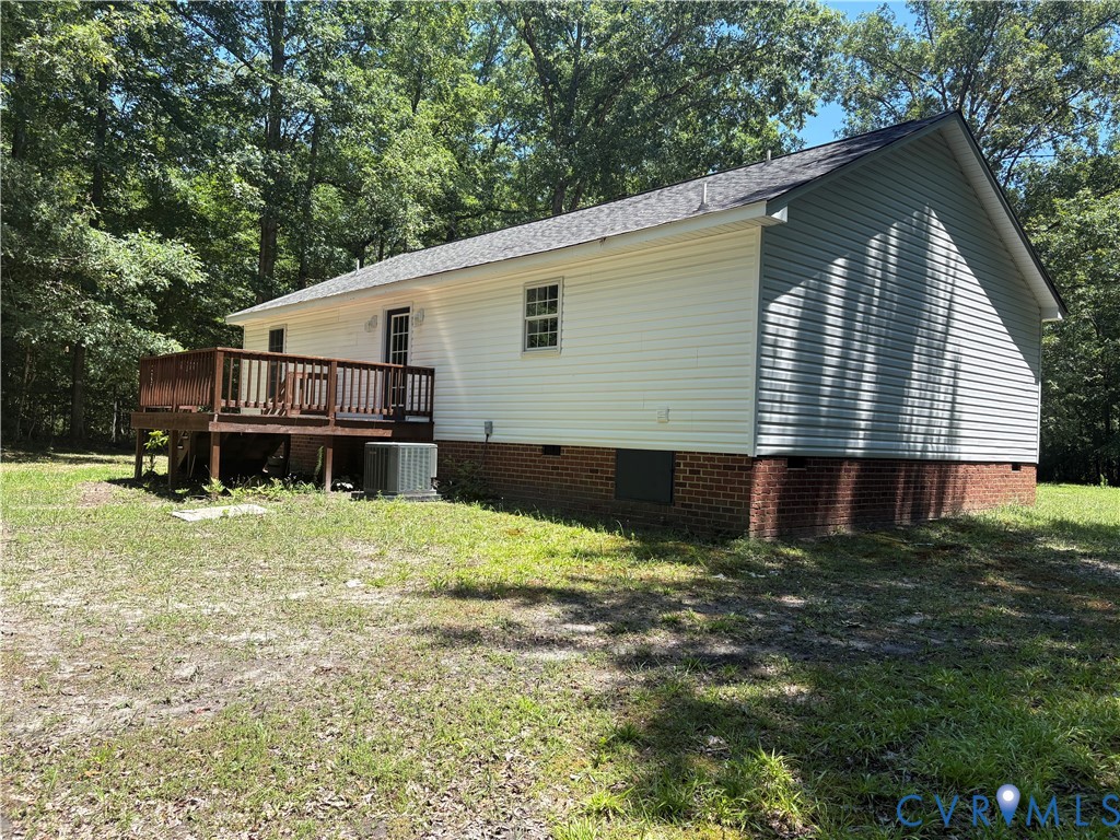 14002 Sunnybrook Road Petersburg, VA 23805 - Photo 19 of 21 Rear exterior featuring a spacious wood deck, whit