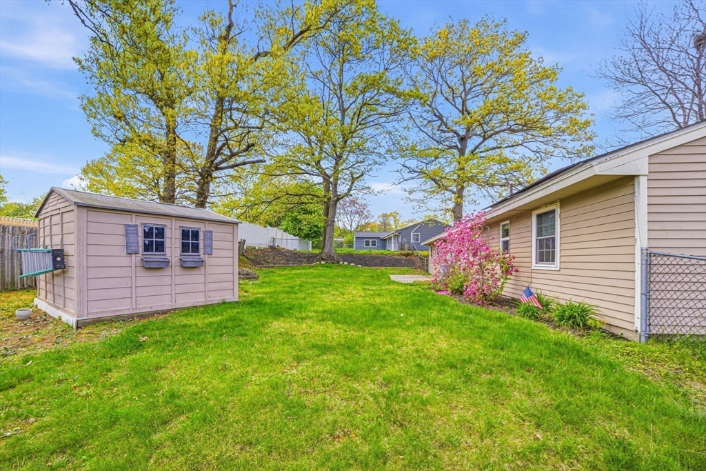 157 Errol Road Brockton, MA 02302 - Photo 5 of 34 a front view of a house with garden