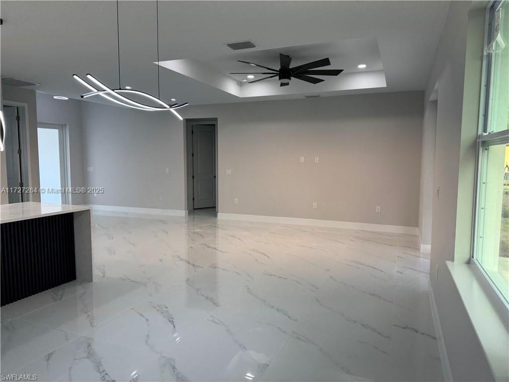 2902 49th Street Southwest Lehigh Acres, FL 33976 - Photo 14 of 26 a view of an empty room with a window