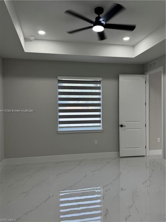 2902 49th Street Southwest Lehigh Acres, FL 33976 - Photo 15 of 26 a view of an empty room with a window