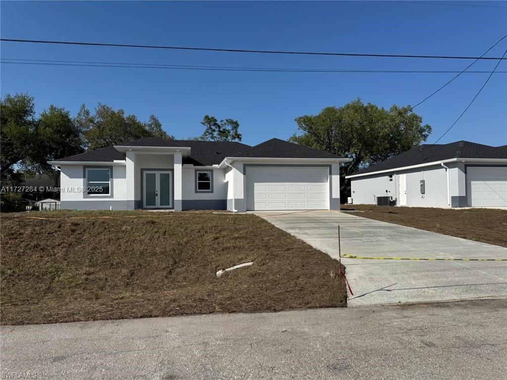 2902 49th Street Southwest Lehigh Acres, FL 33976 - Photo 3 of 26 a house view with a backyard space