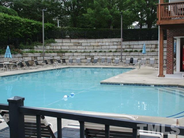 8504 Pillar Gate Lane Raleigh, NC 27613 - Photo 22 of 25 a view of a lake from a balcony