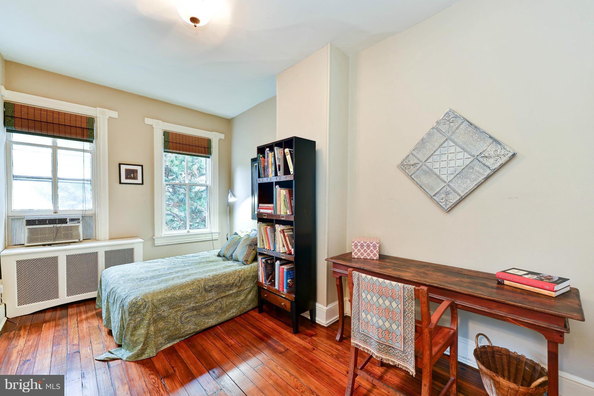 814 E Street Southeast Washington, DC 20003 - Photo 15 of 30 a bedroom with furniture and a window