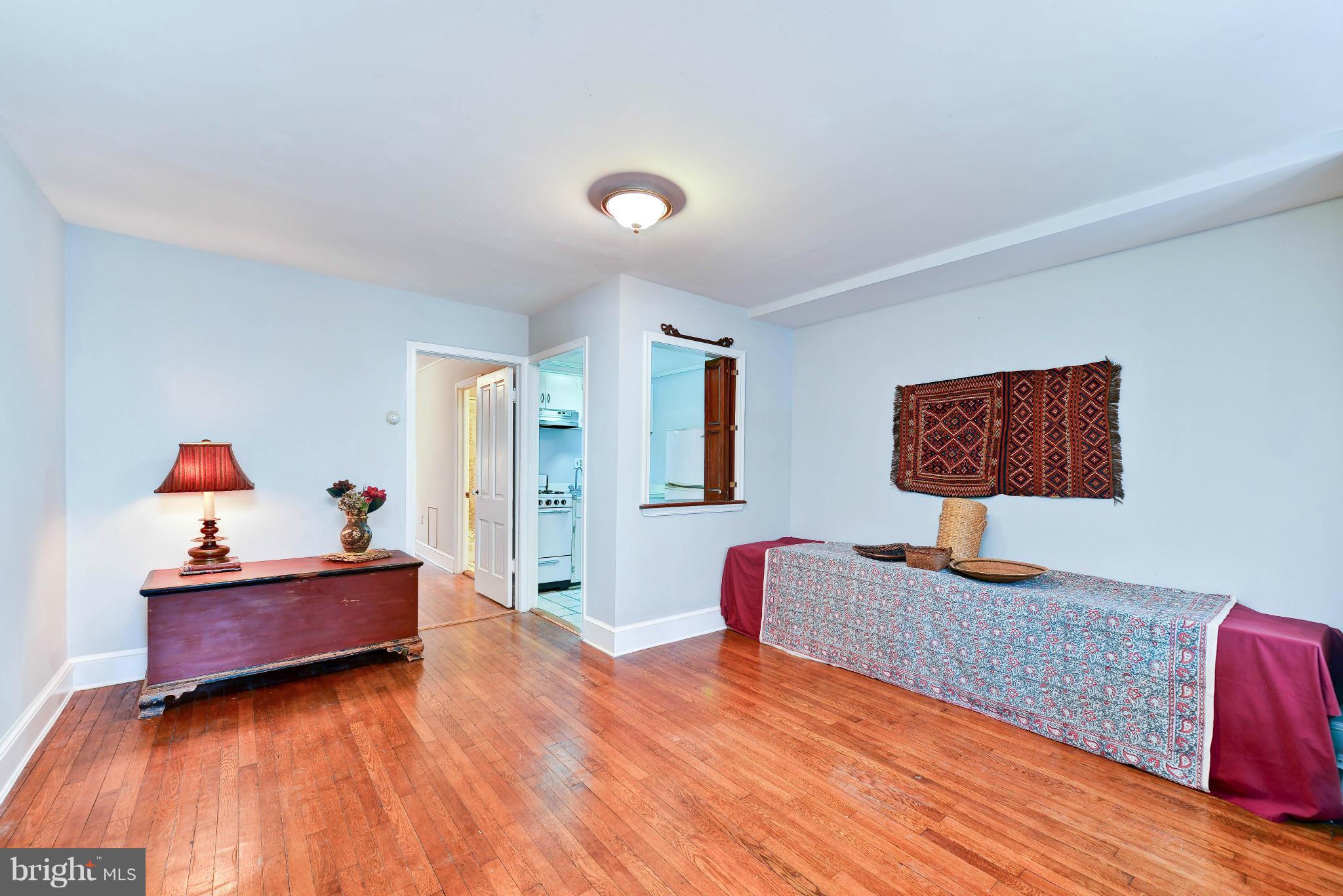 814 E Street Southeast Washington, DC 20003 - Photo 18 of 30 a living room with furniture and a wooden floor