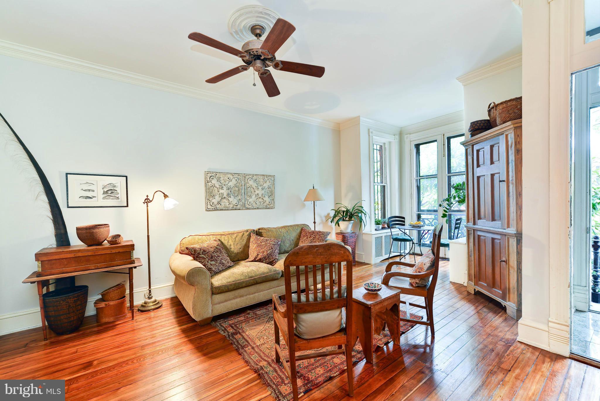 814 E Street Southeast Washington, DC 20003 - Photo 3 of 30 a living room with furniture and a window