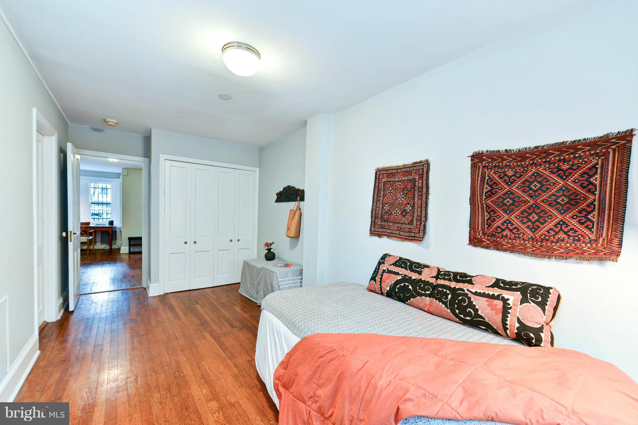 814 E Street Southeast Washington, DC 20003 - Photo 21 of 30 a bed room with a bed and a dresser