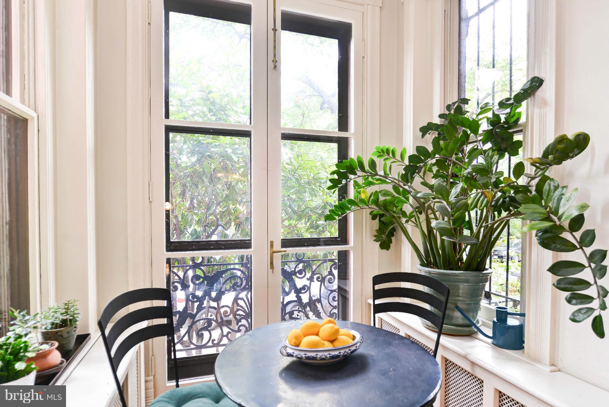 814 E Street Southeast Washington, DC 20003 - Photo 4 of 30 a view of a dining room with furniture window and outside view