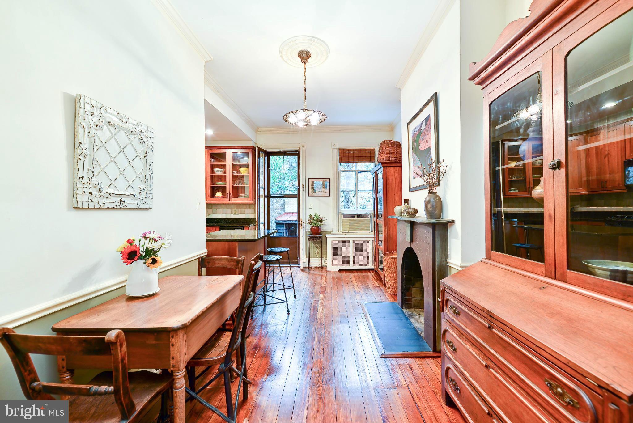 814 E Street Southeast Washington, DC 20003 - Photo 6 of 30 a dining room with wooden floor and furniture