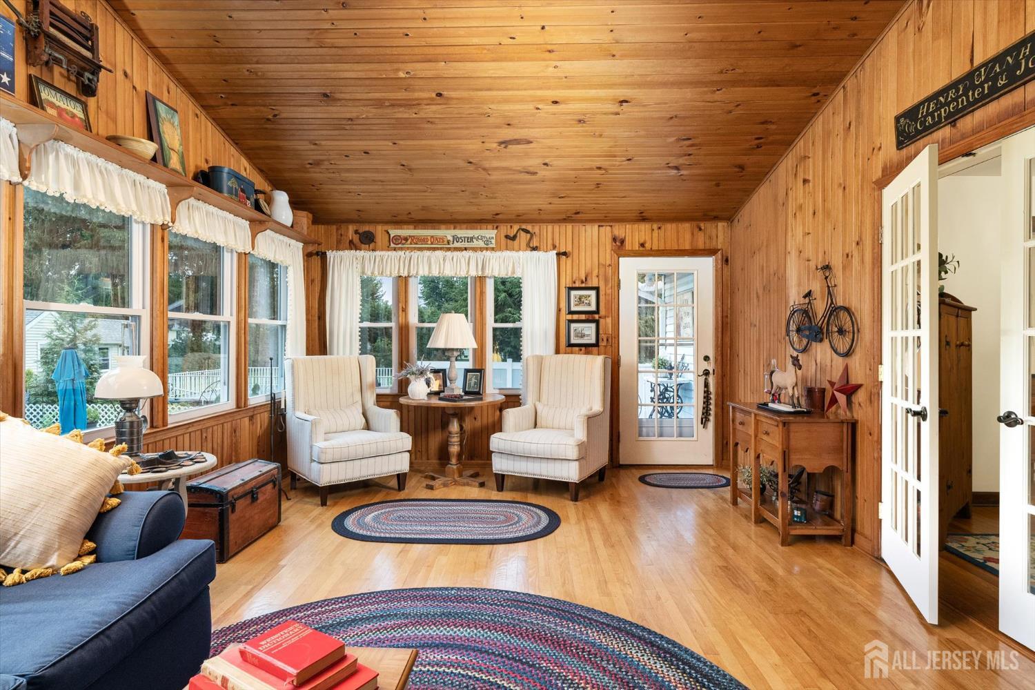 66 Rutgers Avenue Hamilton, NJ 08619 - Photo 15 of 31 a living room with furniture and a wooden floor