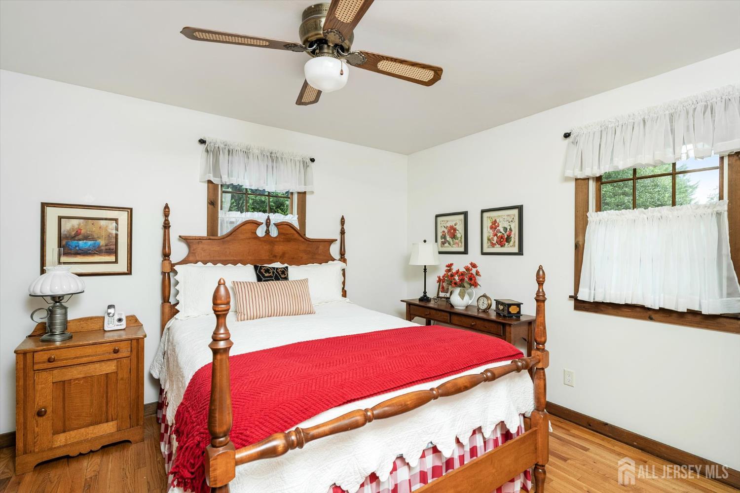 66 Rutgers Avenue Hamilton, NJ 08619 - Photo 17 of 31 a bedroom with a bed and a view of kitchen