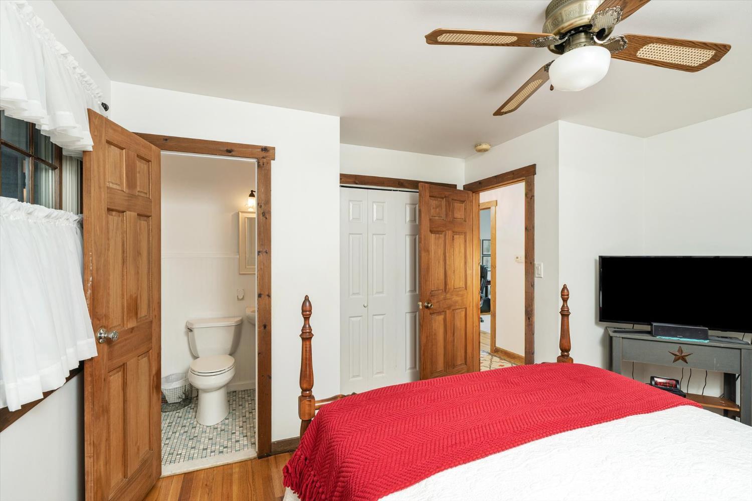 66 Rutgers Avenue Hamilton, NJ 08619 - Photo 18 of 31 a bedroom with a bed and a flat screen tv