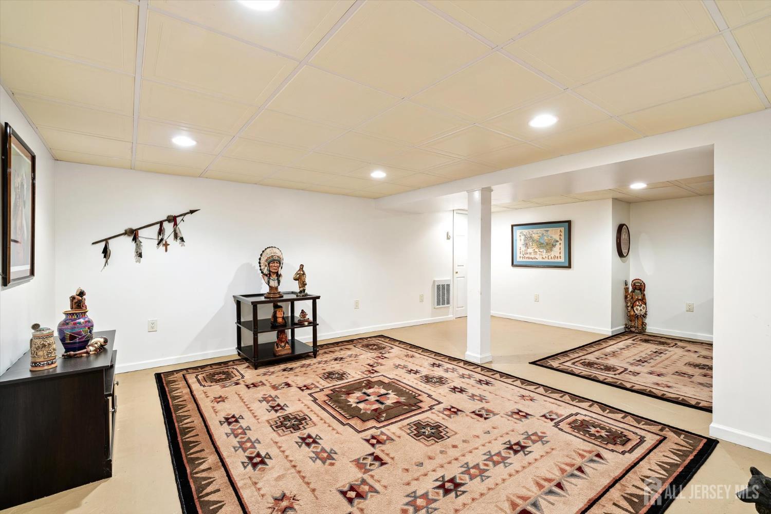 66 Rutgers Avenue Hamilton, NJ 08619 - Photo 23 of 31 a bedroom with a bed and wooden floor