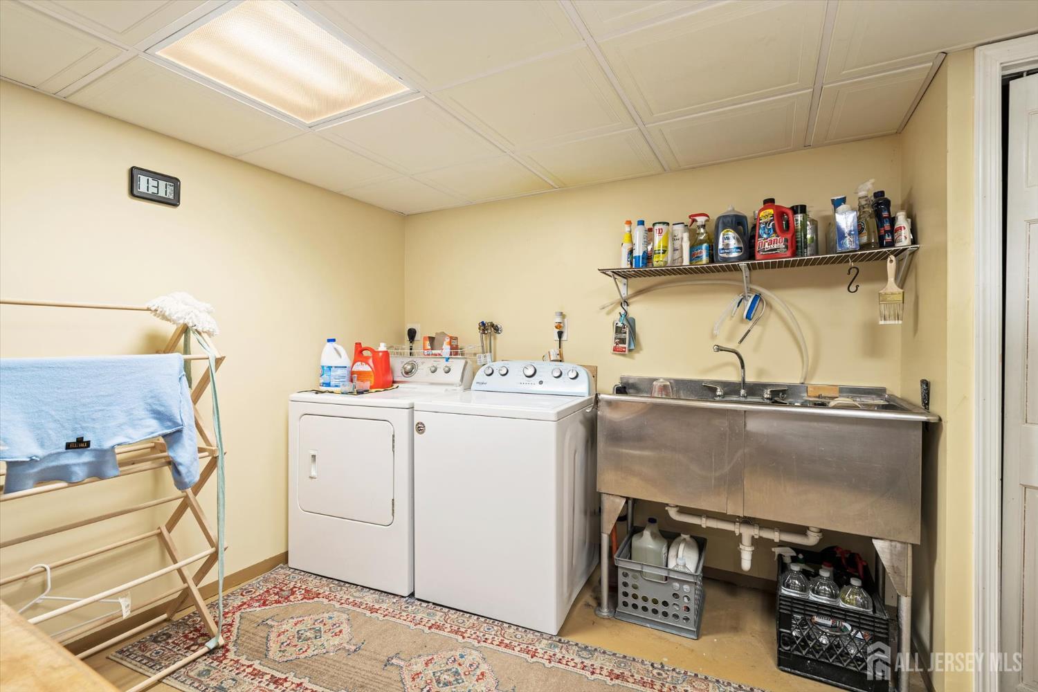 66 Rutgers Avenue Hamilton, NJ 08619 - Photo 26 of 31 a storage room with washer and dryer