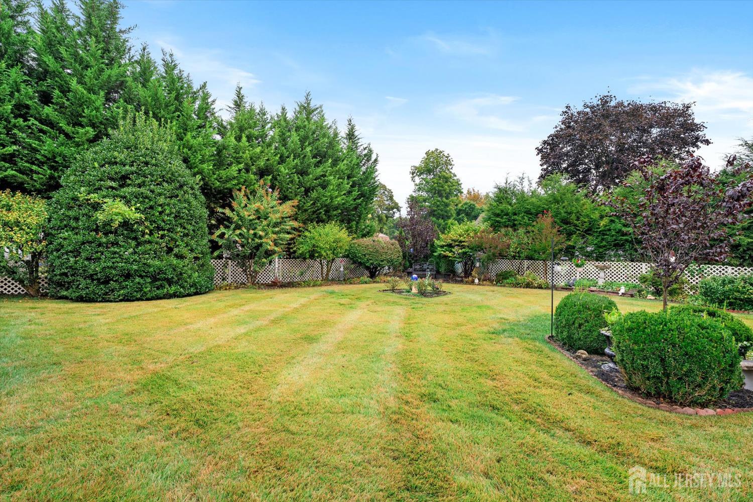 66 Rutgers Avenue Hamilton, NJ 08619 - Photo 29 of 31 a view of a swimming pool and trees in the background