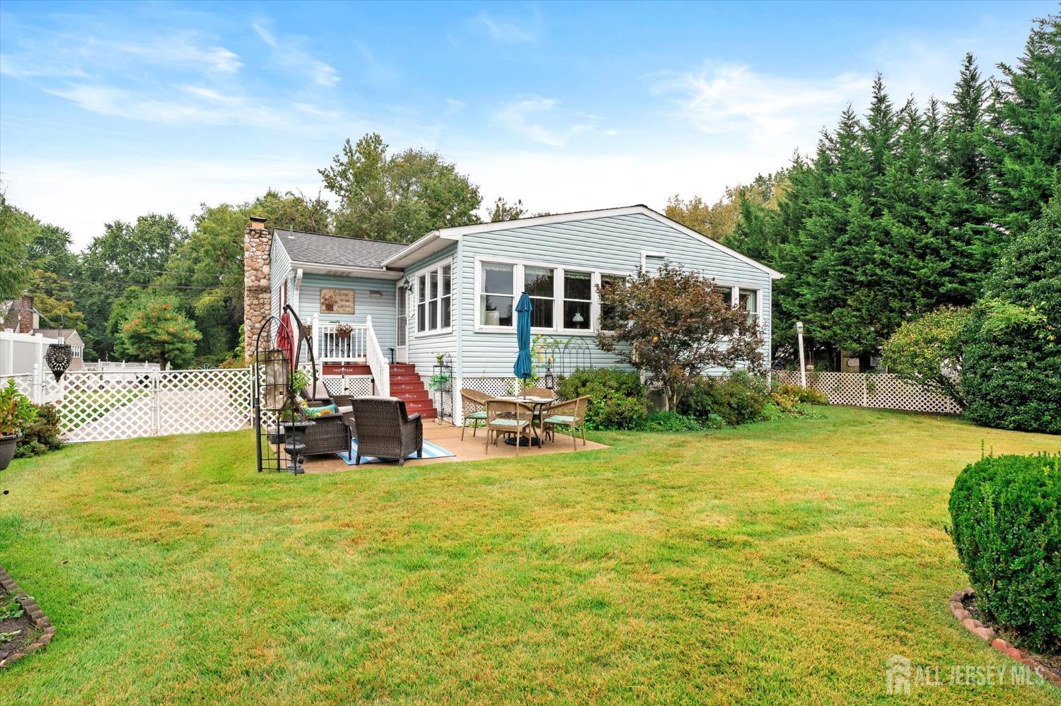 66 Rutgers Avenue Hamilton, NJ 08619 - Photo 31 of 31 a view of a house with a yard patio and sitting area