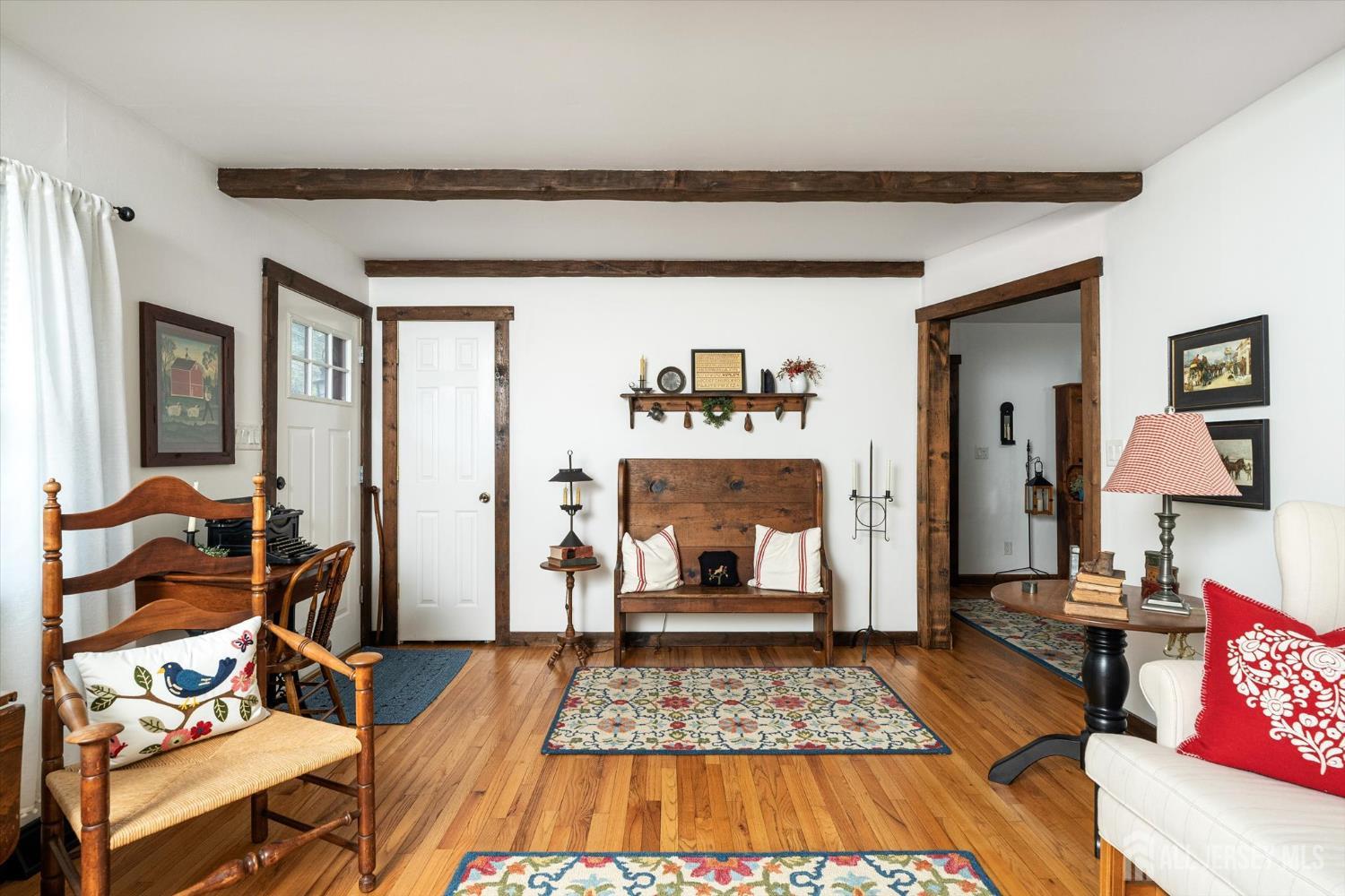 66 Rutgers Avenue Hamilton, NJ 08619 - Photo 6 of 31 a living room with furniture and a rug