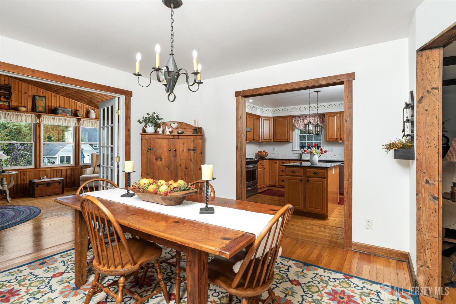 66 Rutgers Avenue Hamilton, NJ 08619 - Photo 8 of 31 a view of a dining room with furniture window and wooden floor