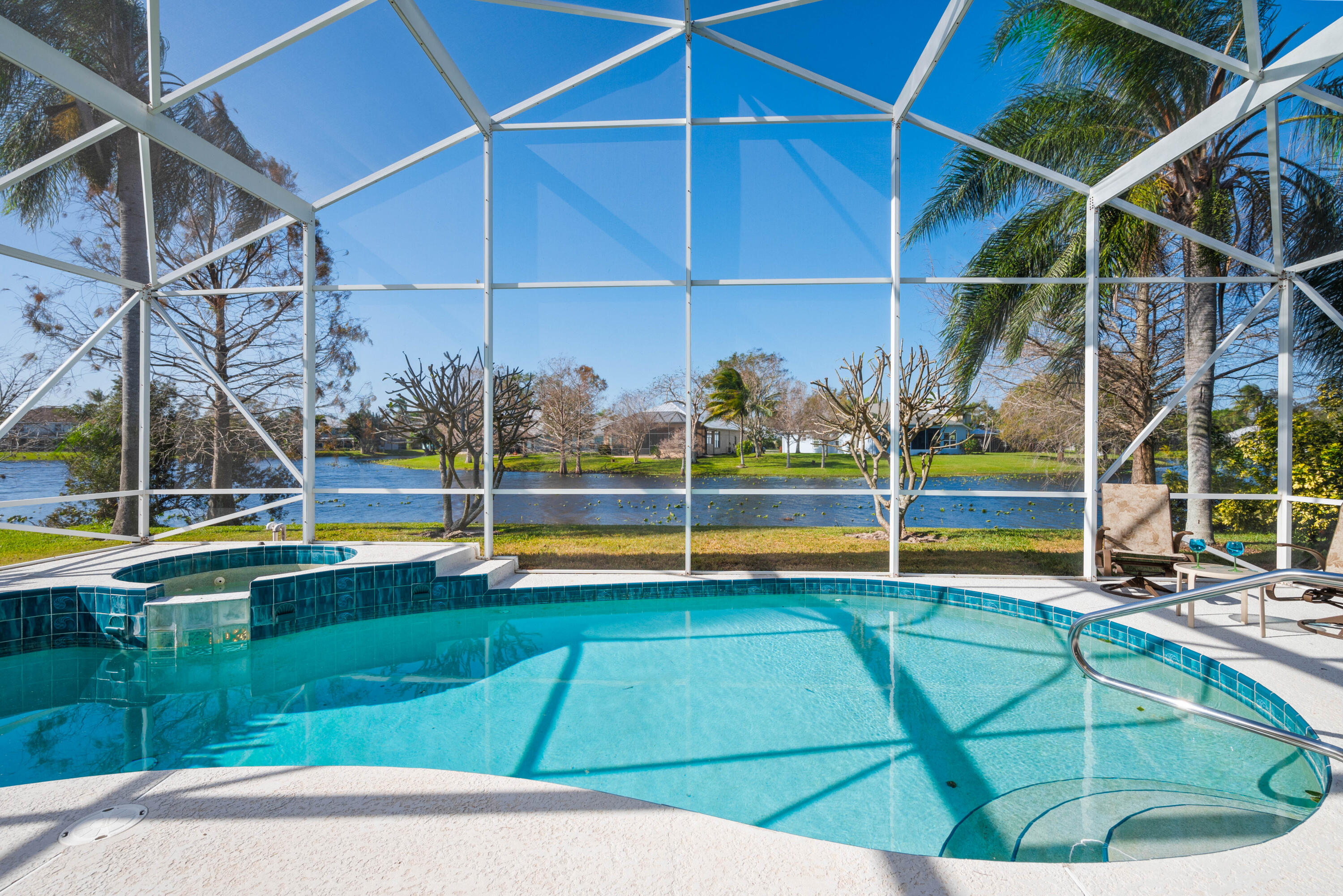 2096 Northwest Marsh Rabbit Lane Jensen Beach, FL 34957 - Photo 1 of 38 a view of a backyard
