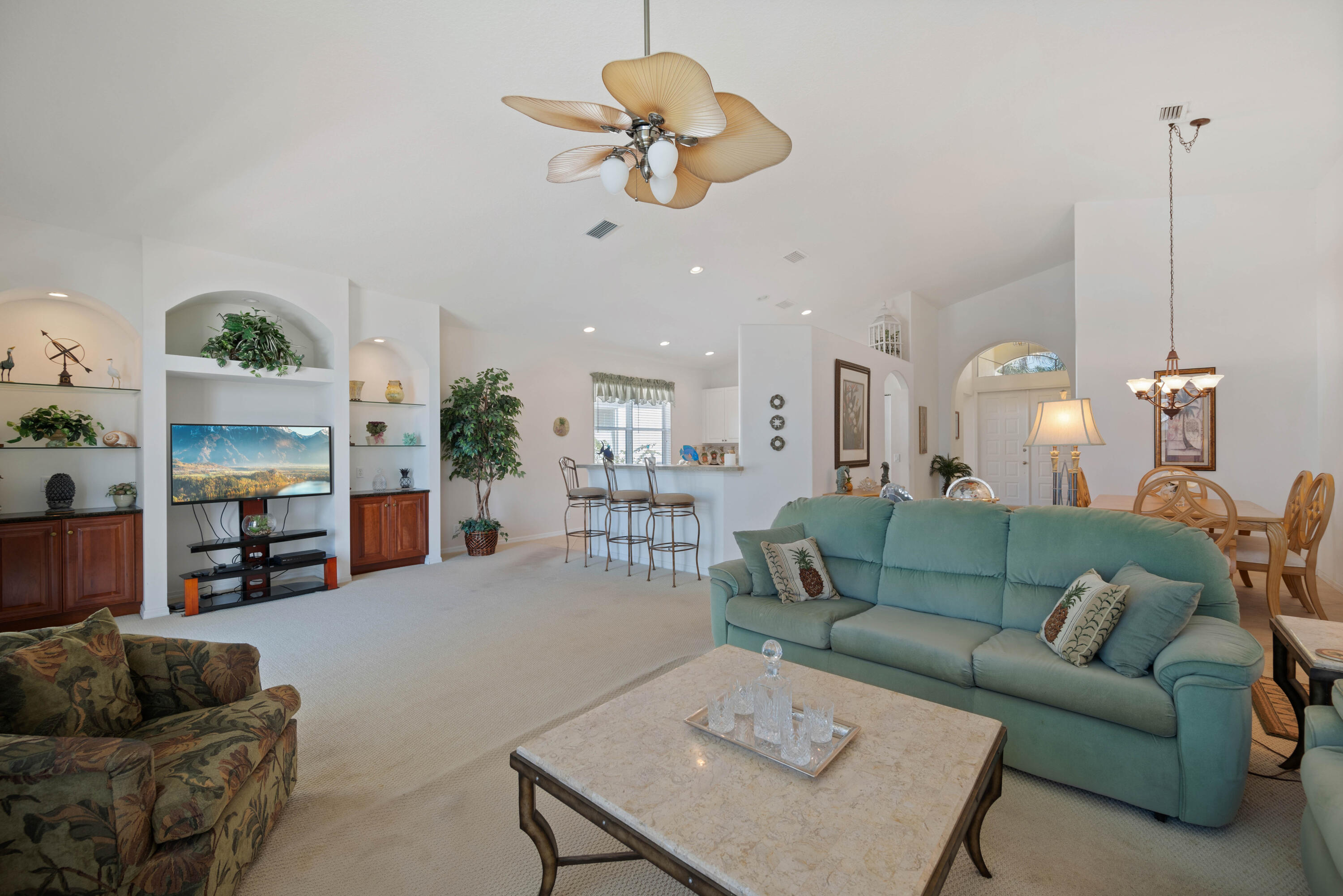 2096 Northwest Marsh Rabbit Lane Jensen Beach, FL 34957 - Photo 9 of 38 a living room with furniture