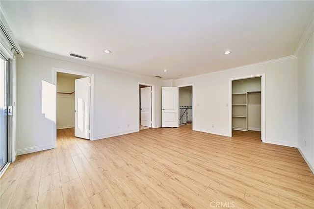 a view of an empty walk in closet